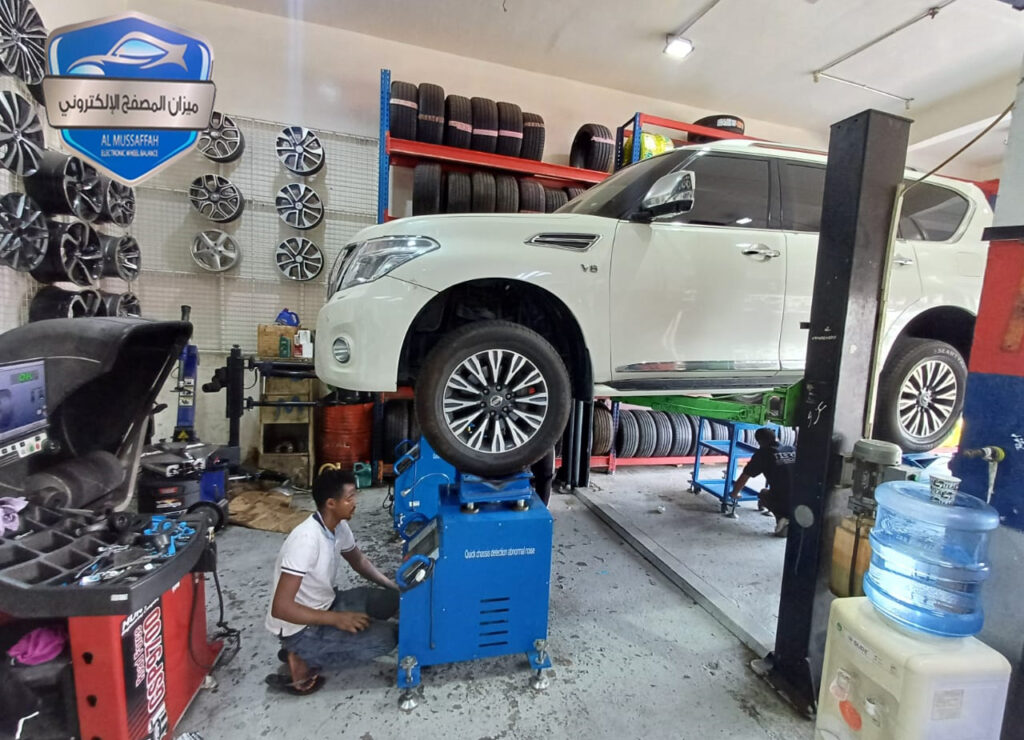 ميزان سيارات في العين